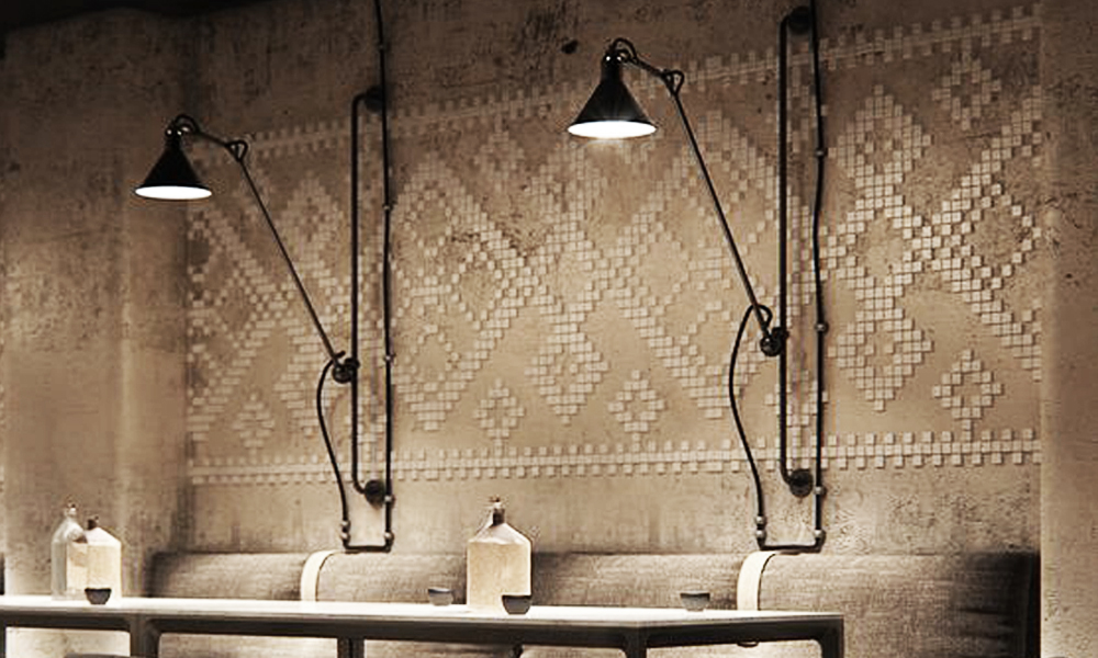 Wall sconce lighting with woven pattern wall reference